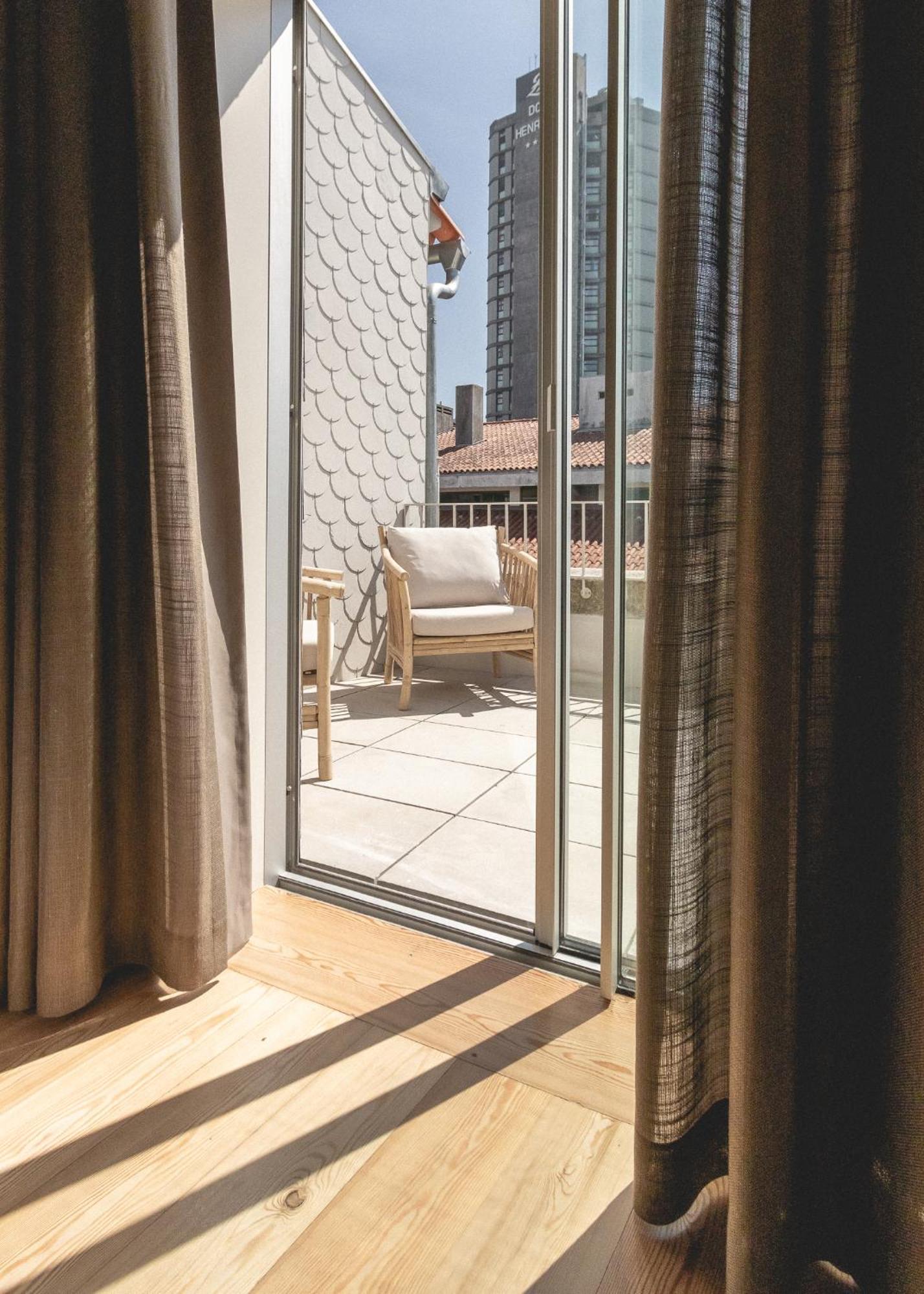 Village Aparthotel By Boa Porto Kamer foto A sliding door